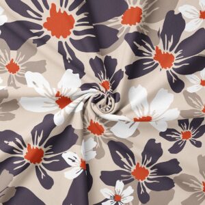 Zbliżenie na wzór tkaniny pokazujące białe i ciemne płatki oraz koralowe środki kwiatów