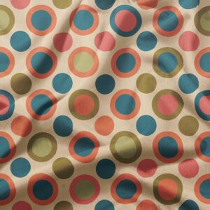 detal tkaniny z kolorowymi okręgami i subtelną teksturą materiału