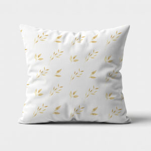 frontalne ujęcie poduszki dekoracyjnej z delikatnym wzorem złotych listków na jasnym tle