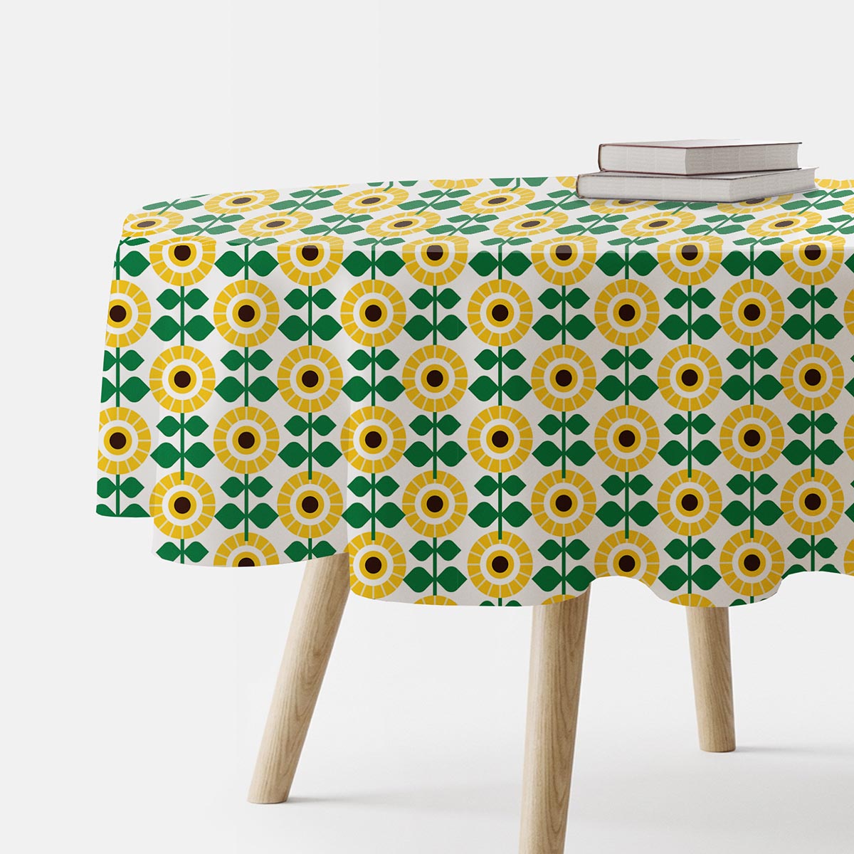 Okrągły obrus z żółto-zielonym wzorem słoneczników na białym tle, główne ujęcie produktu