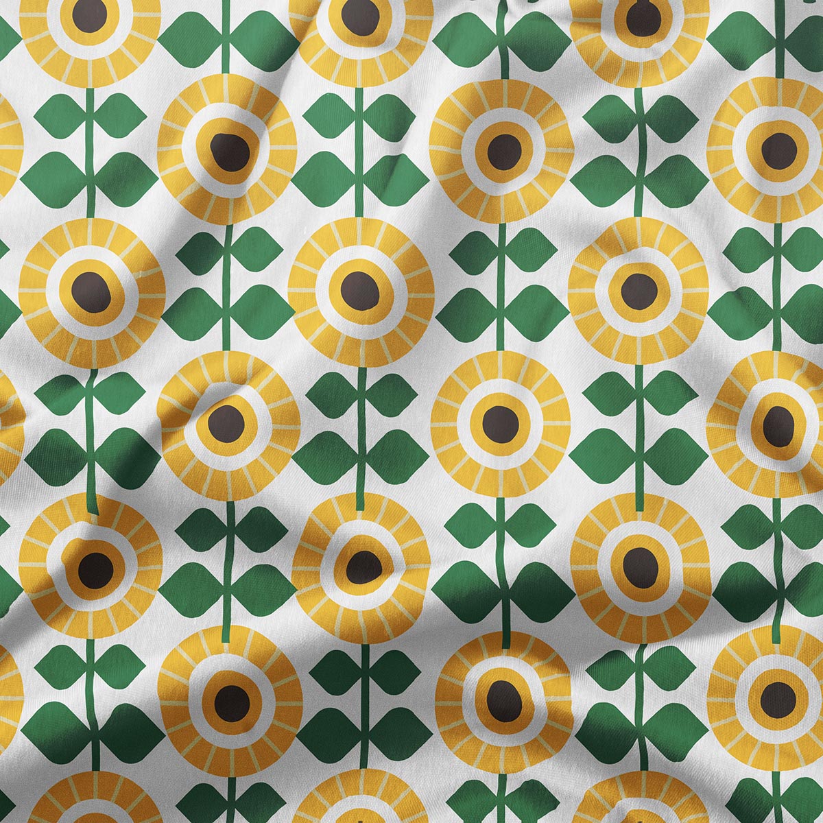 Zbliżenie na geometryczne słoneczniki i zielone liście, detal tkaniny i nadruku