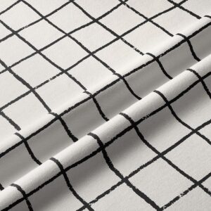 Zbliżenie na fakturę tkaniny i pędzlowe, nieregularne linie wzoru