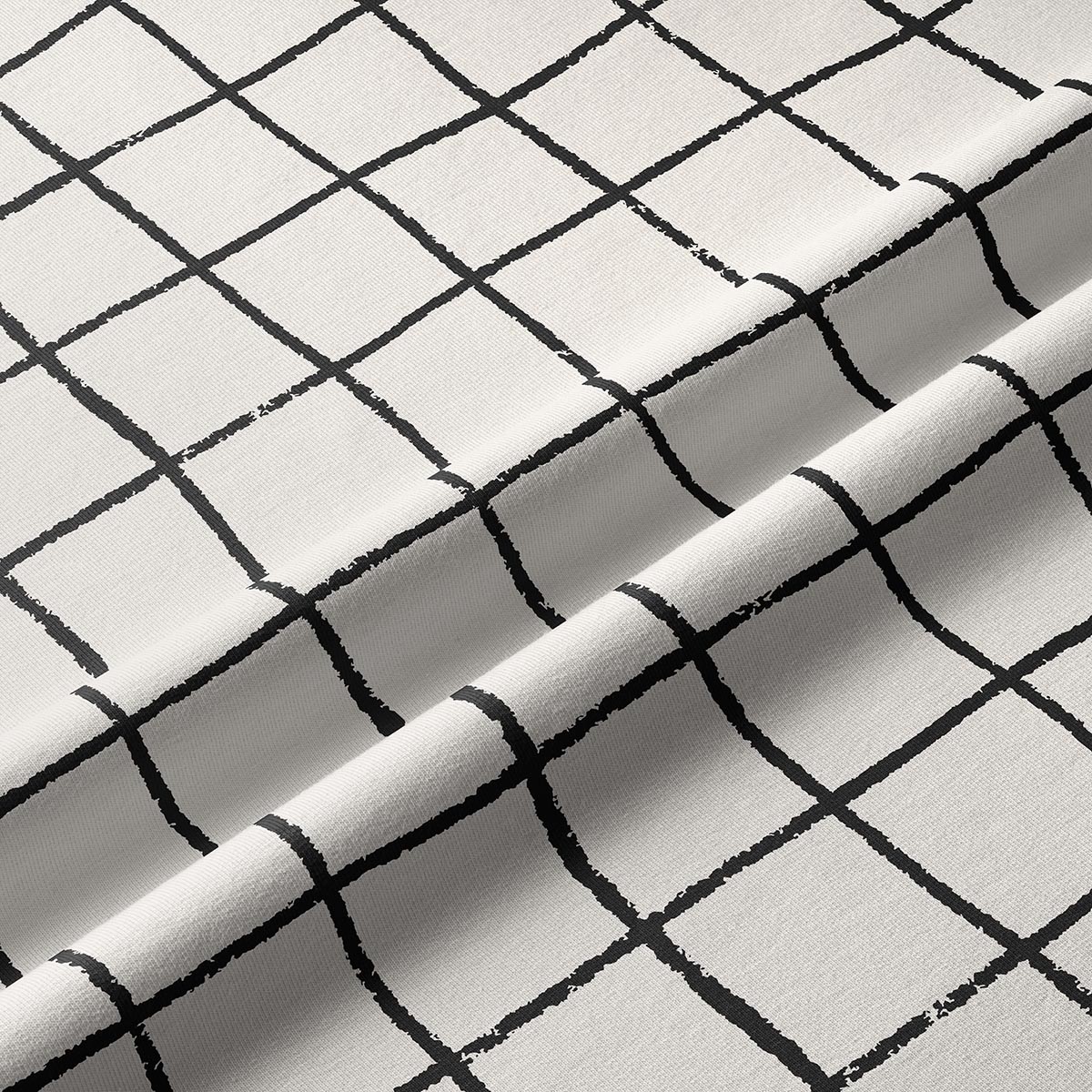 Zbliżenie na fakturę tkaniny i pędzlowe, nieregularne linie wzoru