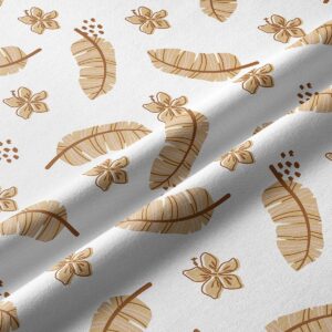 Zbliżenie na materiał bieżnika z wzorem piór i drobnych kwiatów