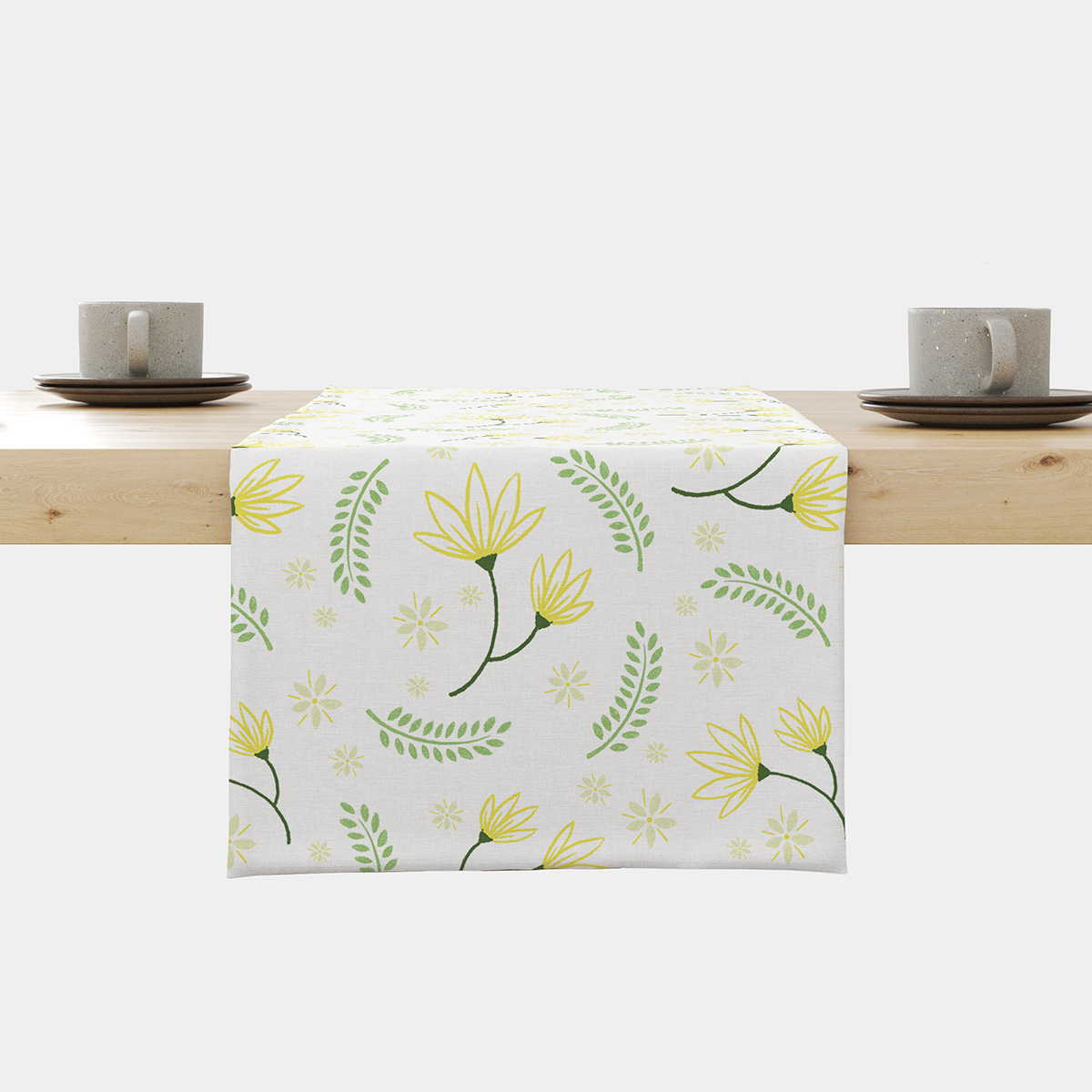 Bieżnik na stole z delikatnym wzorem żółtych kwiatów i zielonych listków, ujęcie frontalne