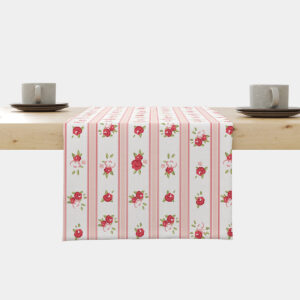 Bieżnik na stole z pionowymi różowymi pasami i drobnymi czerwonymi różyczkami widok z przodu