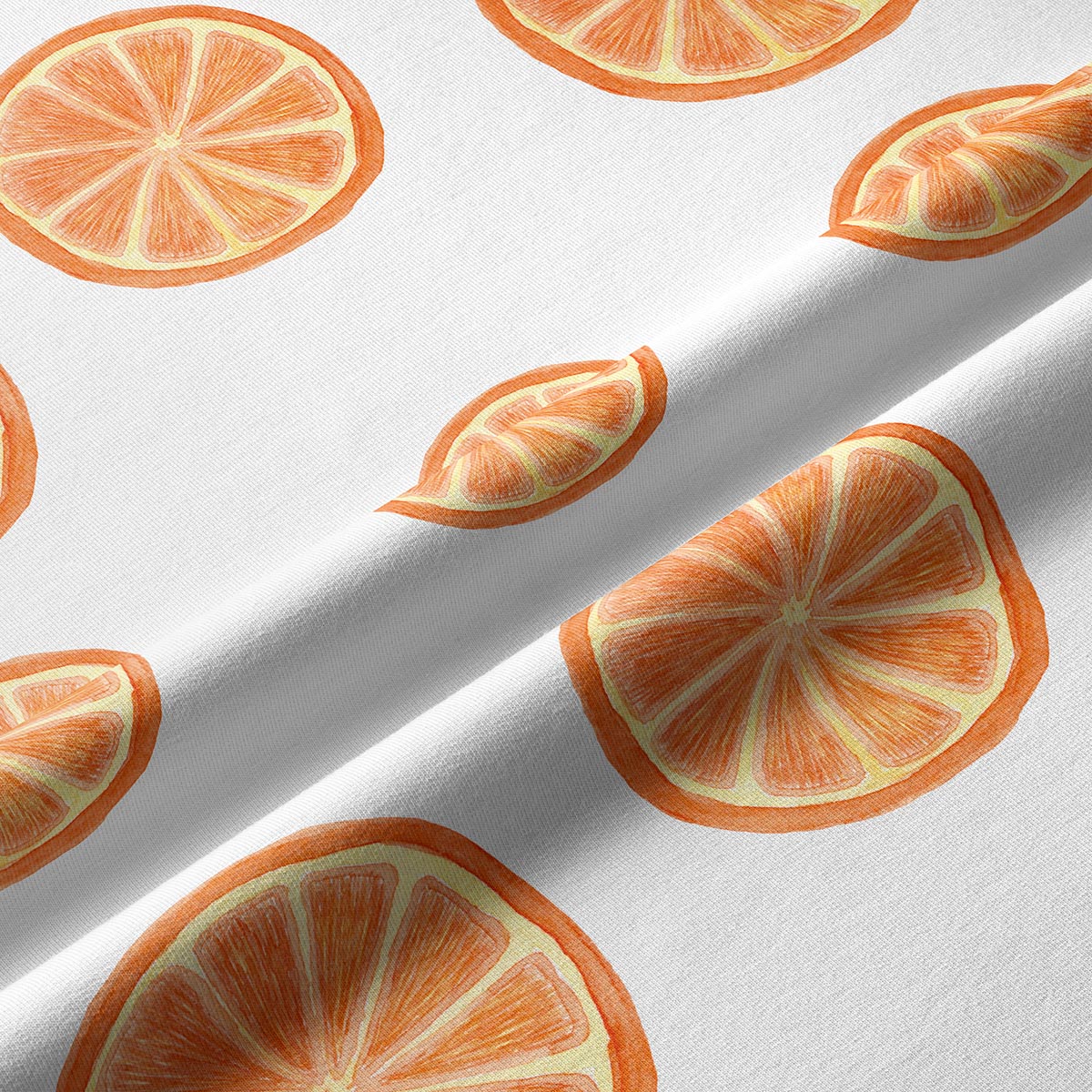 zbliżenie na strukturę tkaniny i rysowane detale plasterków pomarańczy