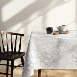 Minimalistyczne nakrycie z filiżanką i imbrykiem na jasnoszarym obrusem