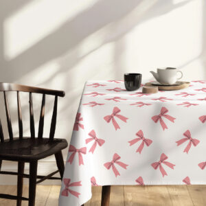 widok rogu obrusa z rozmieszczonymi różowymi kokardkami