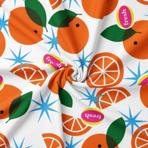 Zbliżenie na grafikę z pomarańczami i niebieskimi gwiazdkami