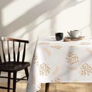 widok boczny stołu z krzesłem przy obrusie ozdobionym delikatnymi złotymi gałązkami