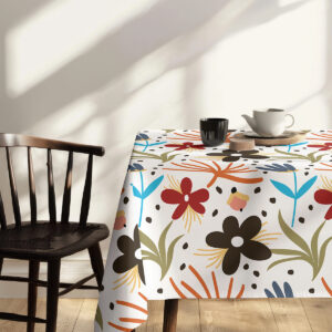 fragment obrusu pokazujący powtórzony, kolorowy motyw kwiatowy przy krześle