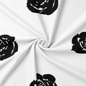 Zbliżenie na strukturę tkaniny i graficzny wzór róży