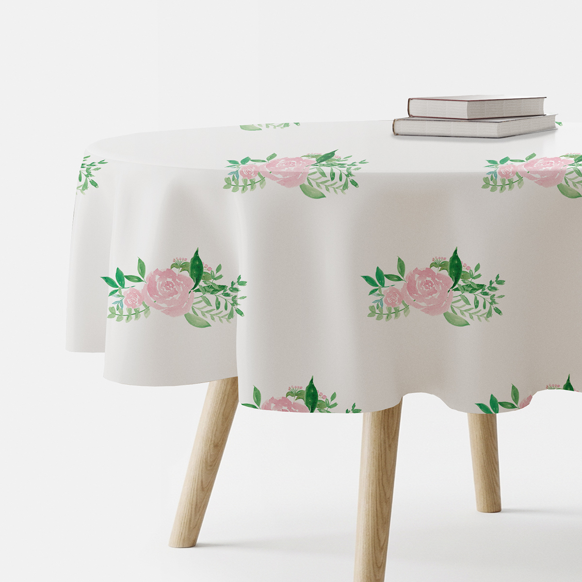 okrągły obrus z różanymi bukiecikami na jasnym tle widok z boku na stolik