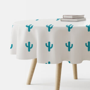 okrągły obrus z turkusowymi kaktusami na białym tle, główne ujęcie produktu z książkami na blacie