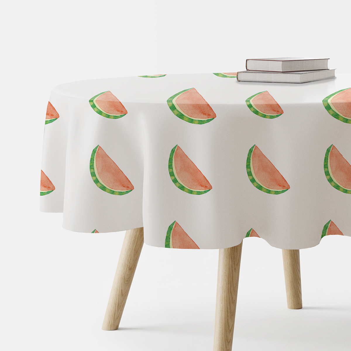 okrągły obrus na stole z wzorem akwarelowych plasterków arbuza