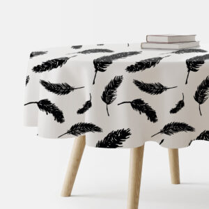 okrągły obrus z czarnymi piórami na jasnym tle, główne ujęcie produktu
