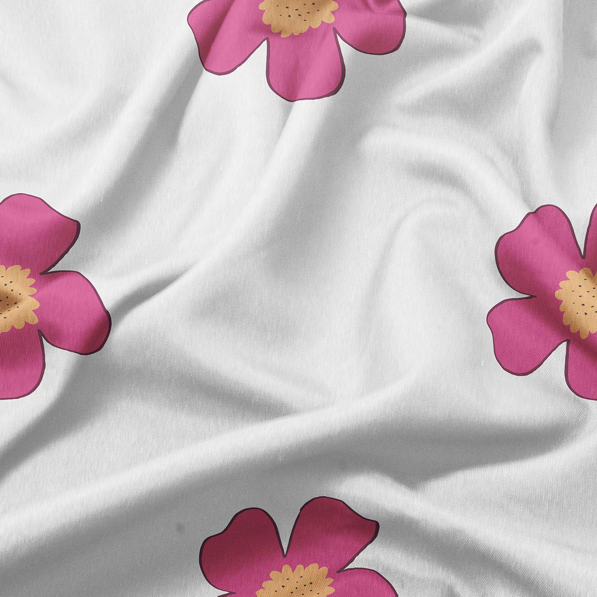 zbliżenie na tkaninę z różowymi kwiatami i żółtym środkiem