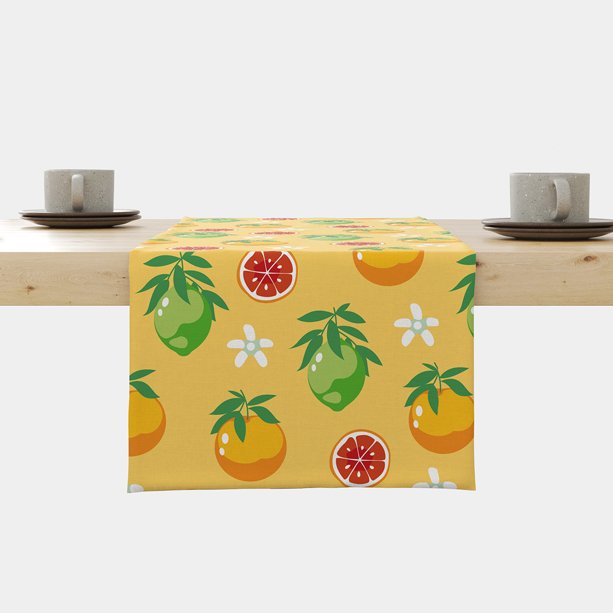 Bieżnik na stole z żółtym tłem i motywem zielonych i pomarańczowych cytrusów