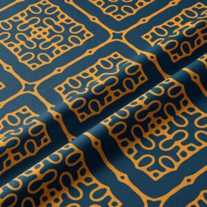 Zbliżenie na detal tkaniny i musztardowy wzór na granatowym tle