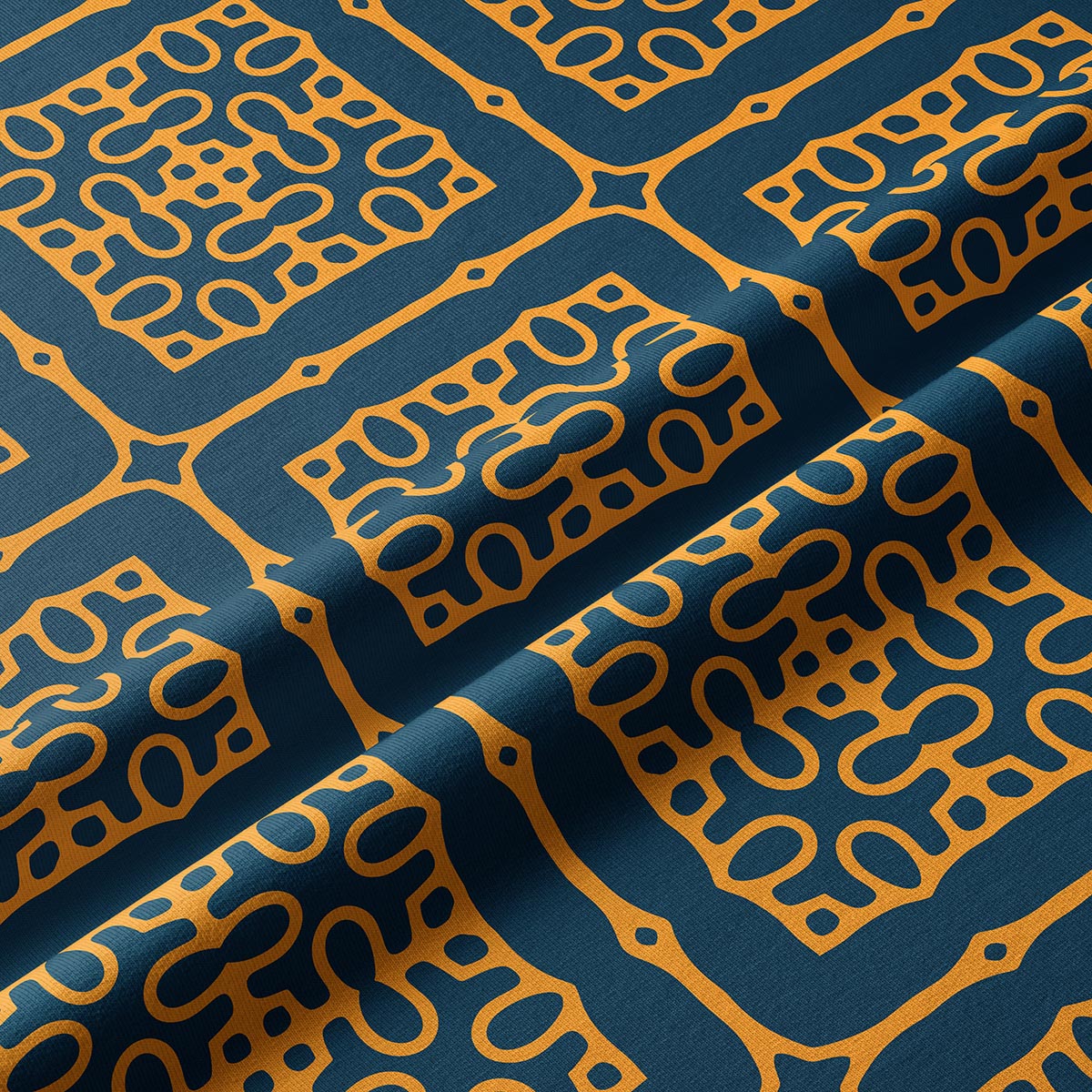 Zbliżenie na detal tkaniny i musztardowy wzór na granatowym tle
