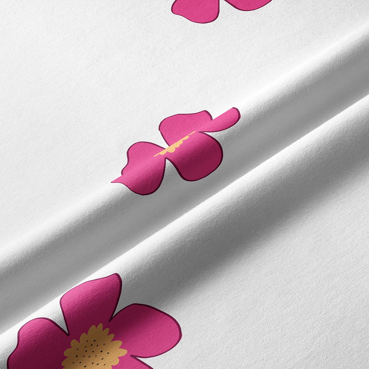 zbliżenie na tkaninę i nadruk pokazujące fakturę materiału i detal kwiatu