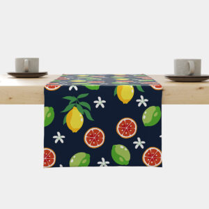 Bieżnik rozłożony na stole z motywem cytrusów na granatowym tle