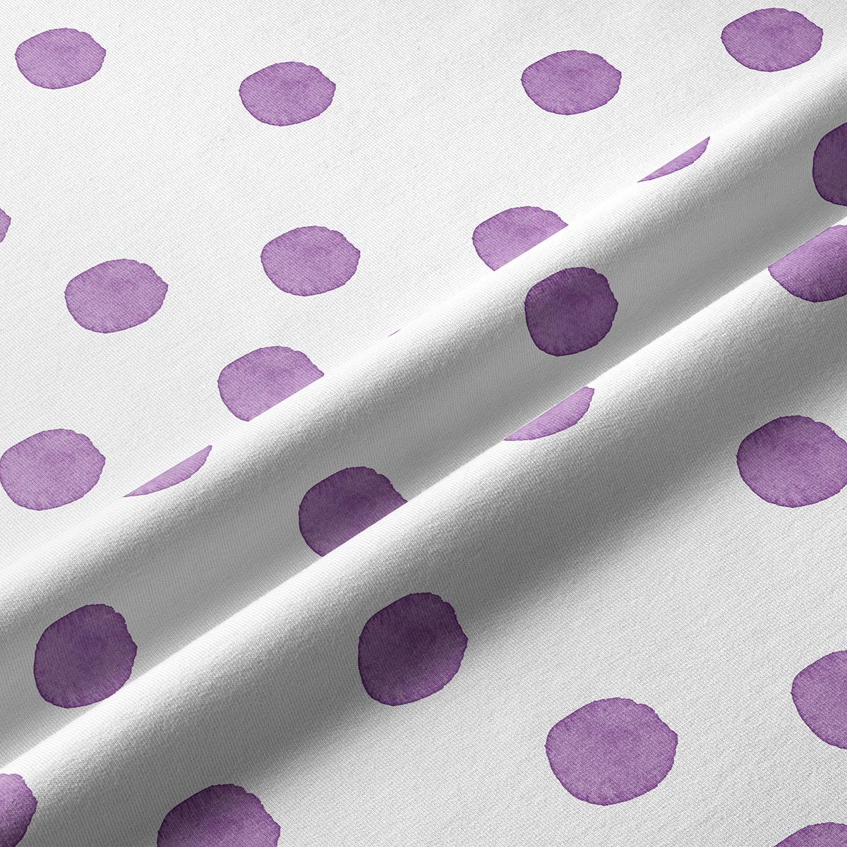 Zbliżenie na fakturę materiału i nieregularne fioletowe kropki wykonane techniką akwareli