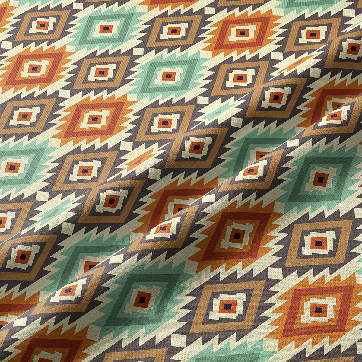 Zbliżenie na fakturę tkaniny i geometryczny wzór rombów w odcieniach mięty, terakoty i brązu