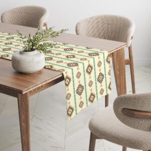 Widok bieżnika rozłożonego na stole w jasnym, przytulnym wnętrzu