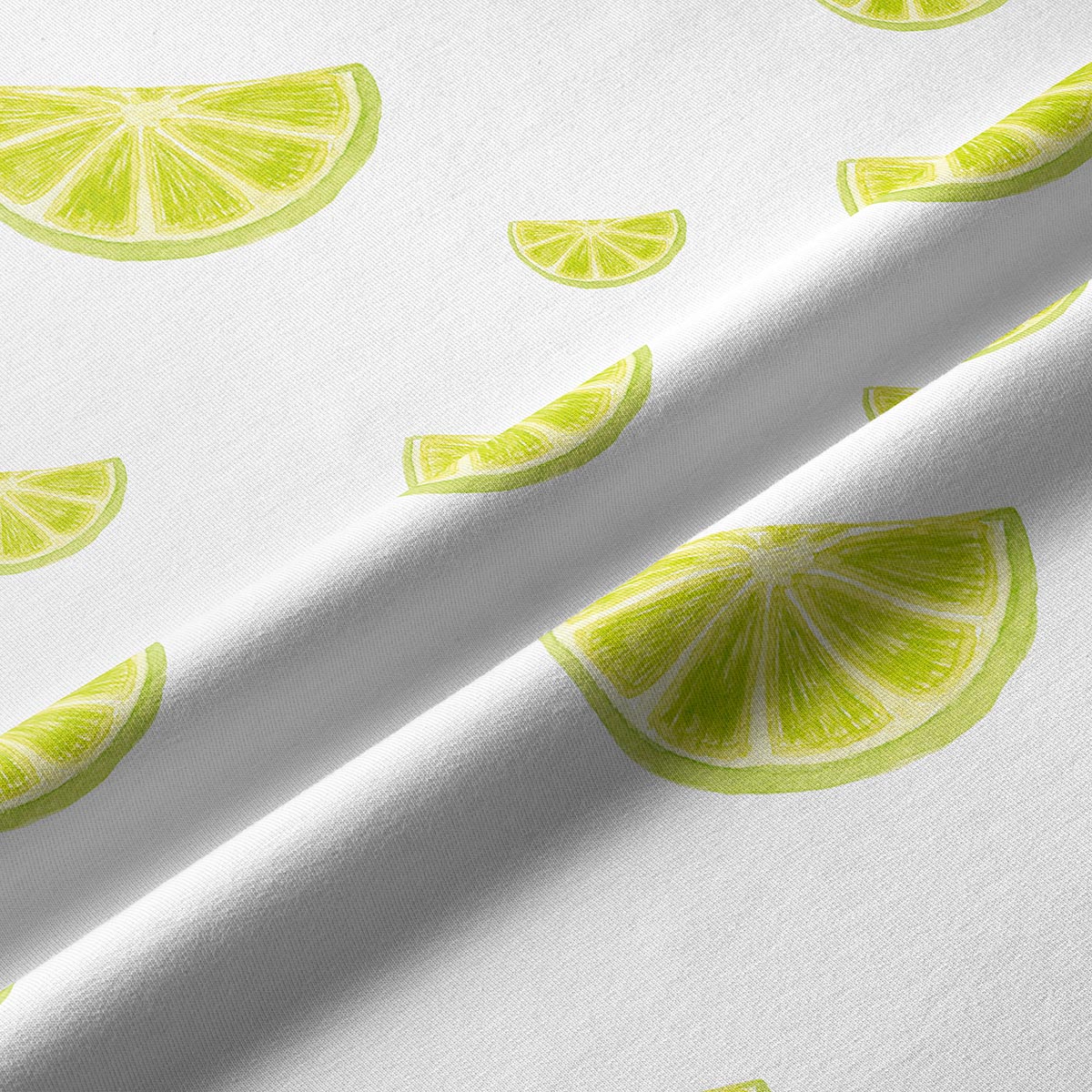 Zbliżenie na fakturę tkaniny i detale nadruku plasterków limonki