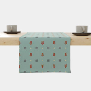 Bieżnik na stole w miętowym kolorze z powtarzalnym geometrycznym wzorem