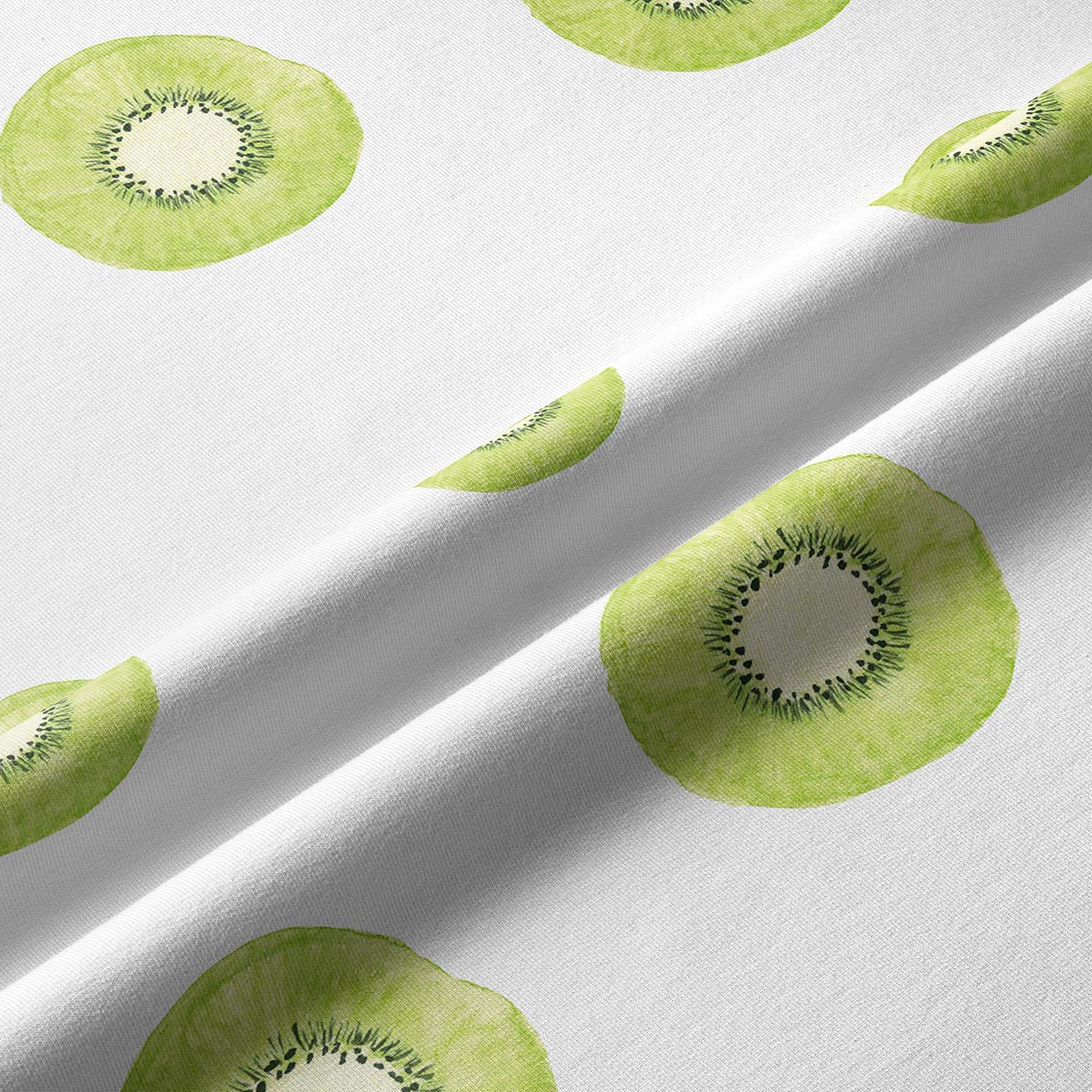 zbliżenie na akwarelowy nadruk plastra kiwi i fakturę tkaniny