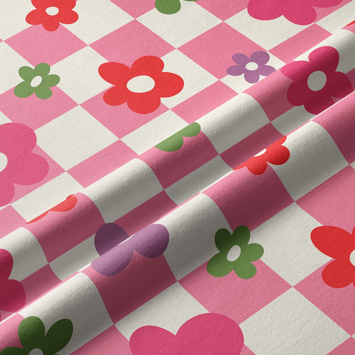 Zbliżenie na fakturę tkaniny z nadrukiem kratki i płaskich kwiatów