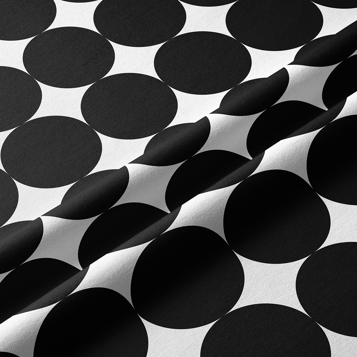 zbliżenie na tkaninę bieżnika i kontrastowy wzór czarnych kół na białym tle