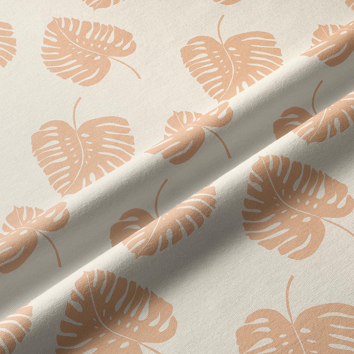 Zbliżenie tkaniny i nadruku liści, widoczna struktura materiału