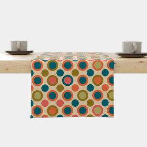 Bieżnik rozłożony na stole z wzorem kolorowych okrągłych kropek w stylu retro