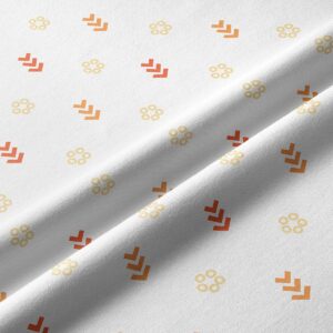 Zbliżenie materiału pokazujące fakturę tkaniny i powtarzalny, drobny wzór