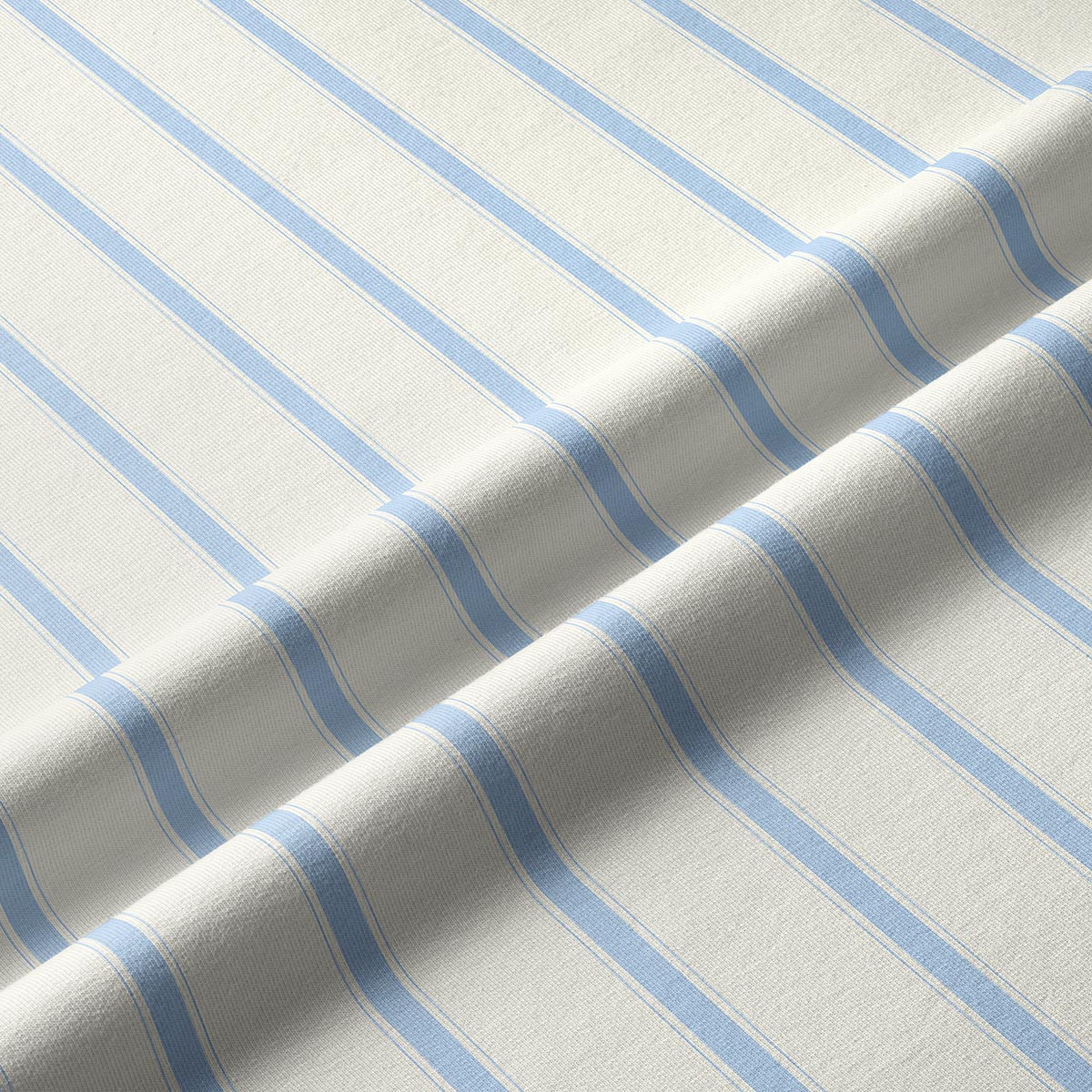 zbliżenie na fakturę tkaniny i delikatne błękitne paski