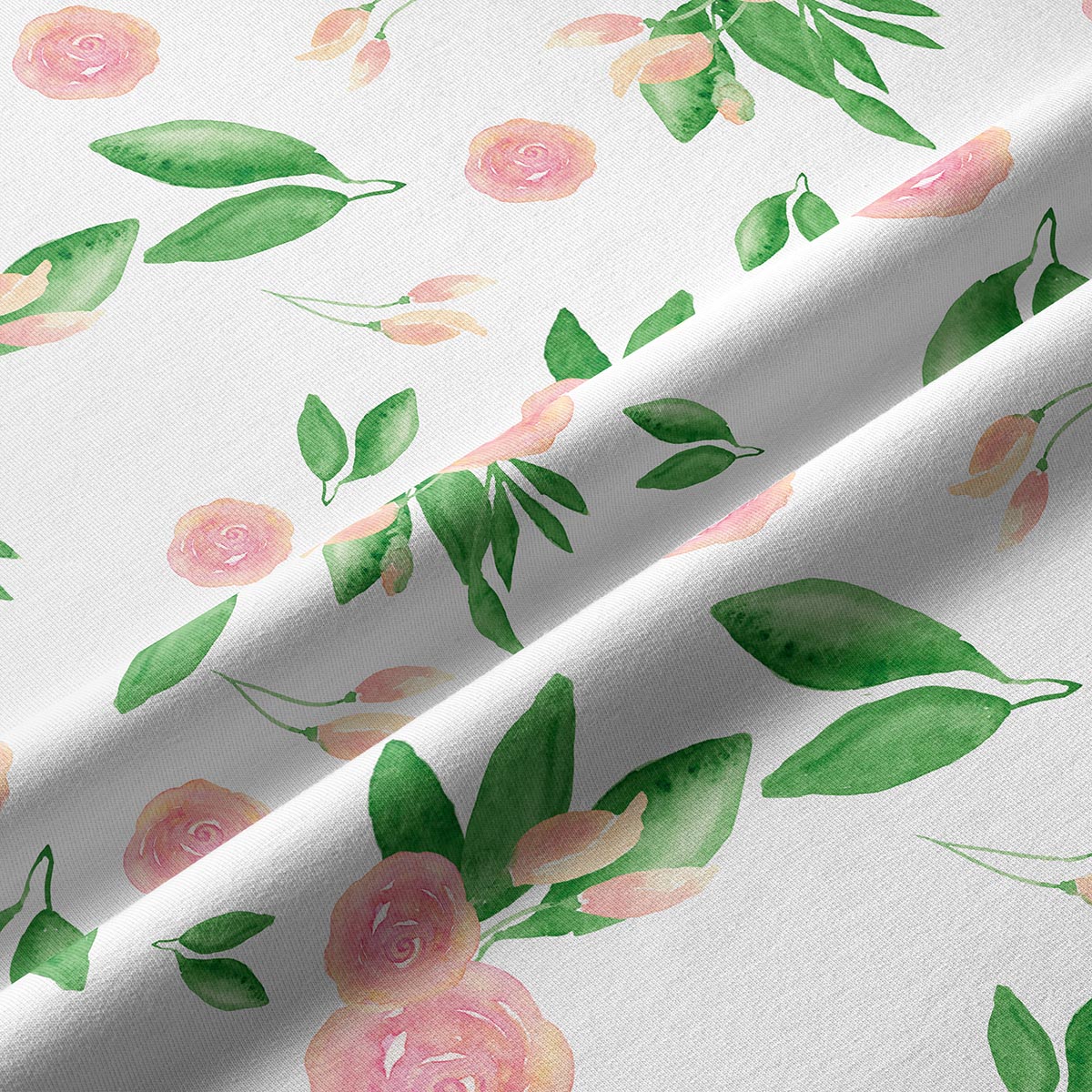 Zbliżenie na fakturę tkaniny i detal akwarelowego wzoru pastelowych różyczek