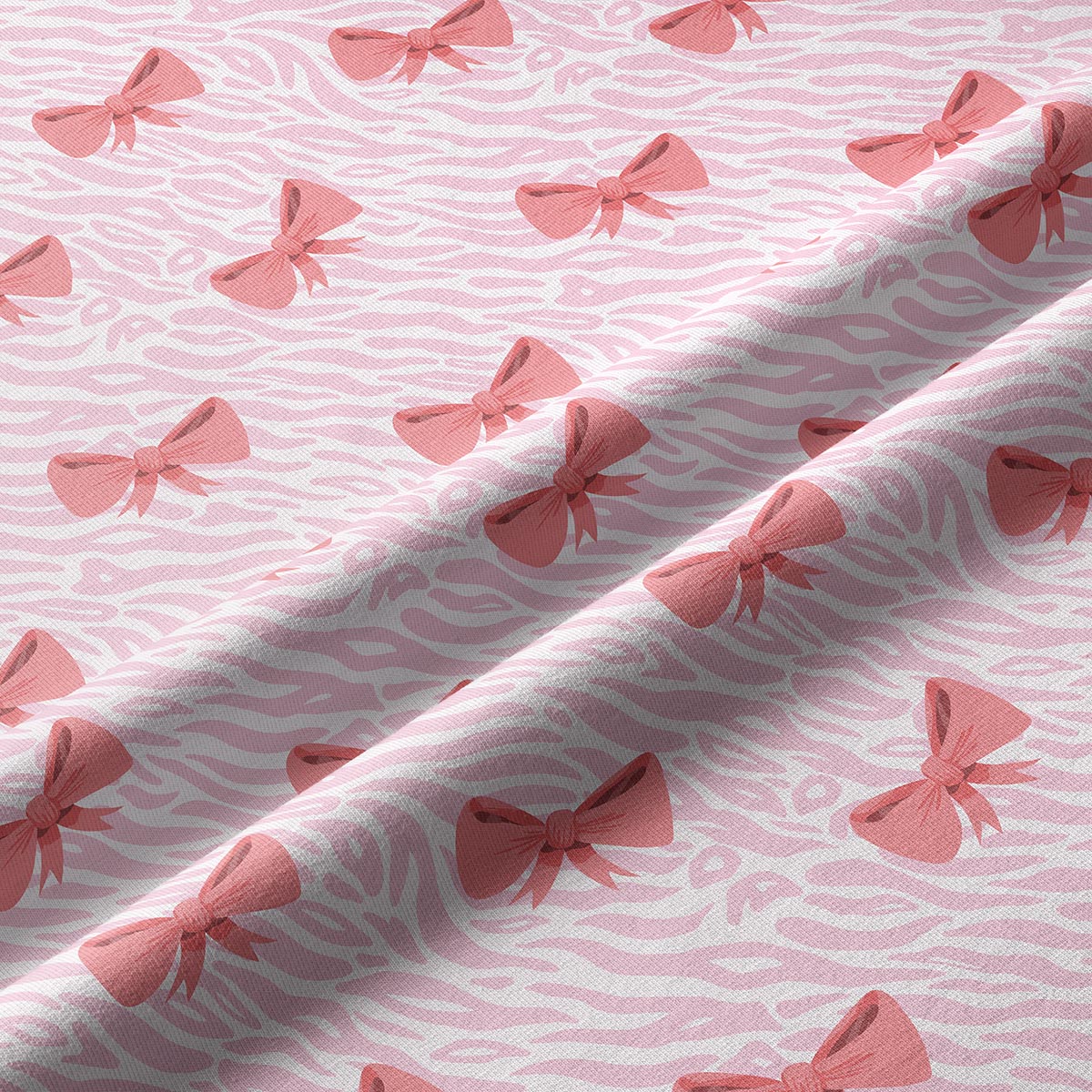 Zbliżenie na wzór kokardek i subtelną fakturę tkaniny bieżnika