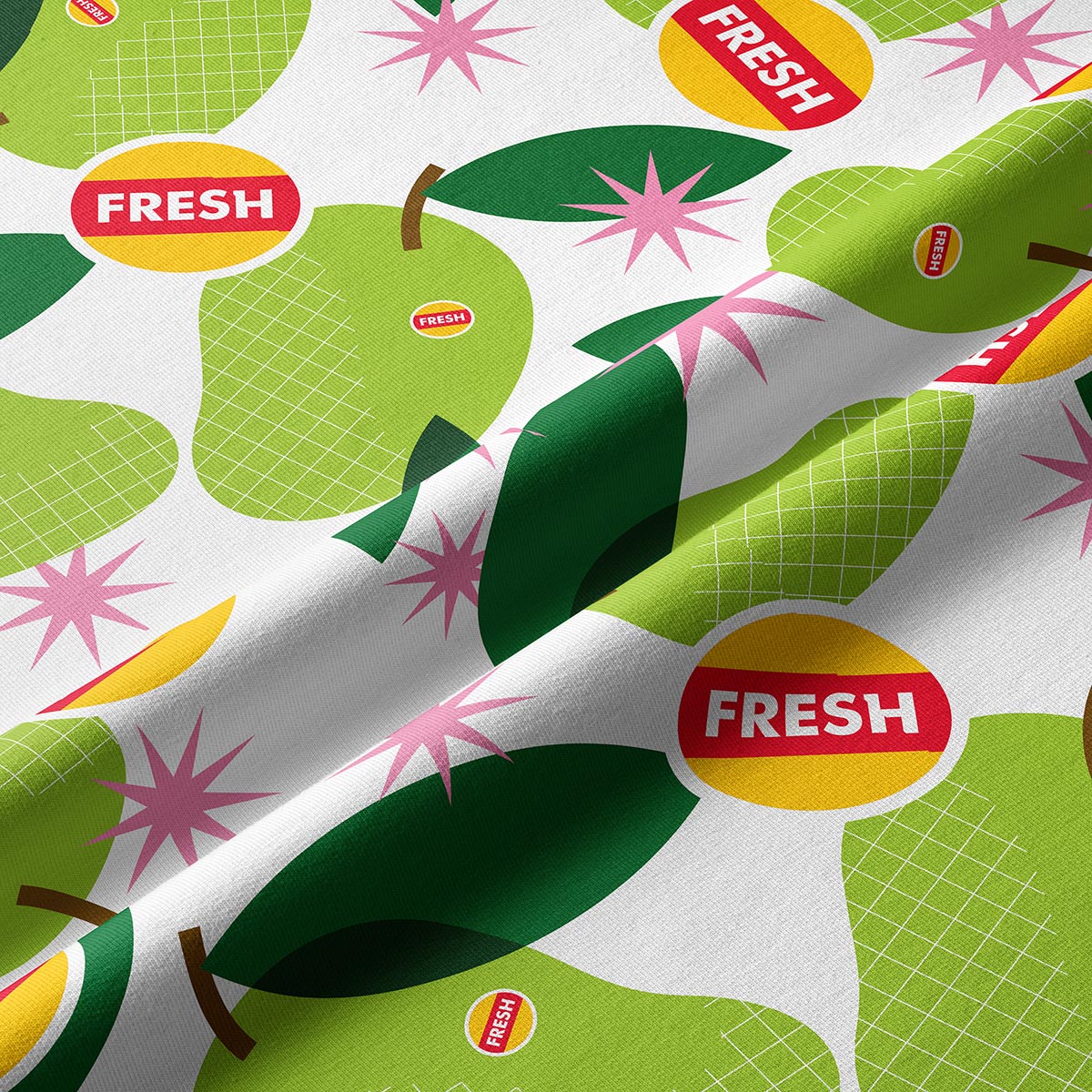 Zbliżenie tkaniny pokazujące fakturę i detale wzoru z gruszkami i napisem Fresh