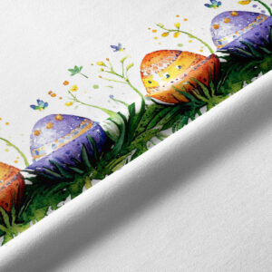 Zbliżenie na akwarelowe pisanki i szczegóły druku na tkaninie