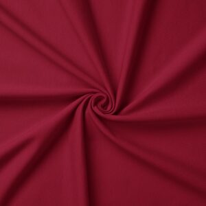 detal tkaniny obrusu pokazujący gładką fakturę i marszczenie w środku