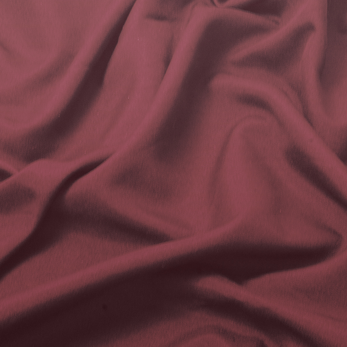 Zbliżenie na strukturę materiału obrusu, gładka tkanina i subtelne fałdy