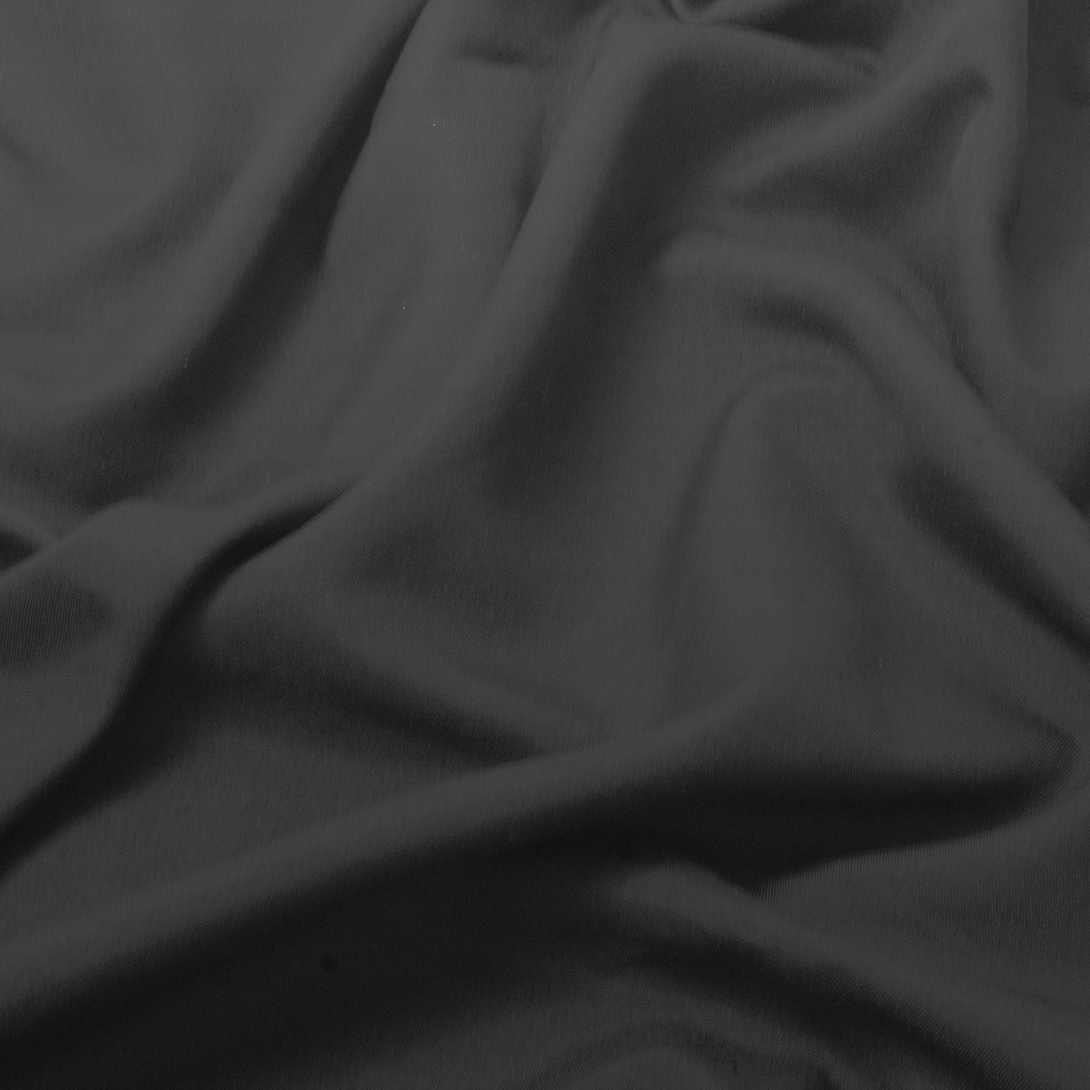 detal gładkiej tkaniny obrusowej w czarnym kolorze