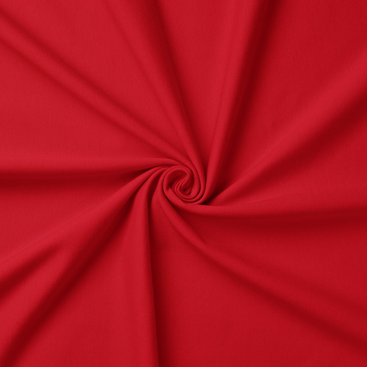 detal tkaniny obrusu zwiniętej w ślimak ukazujący strukturę materiału