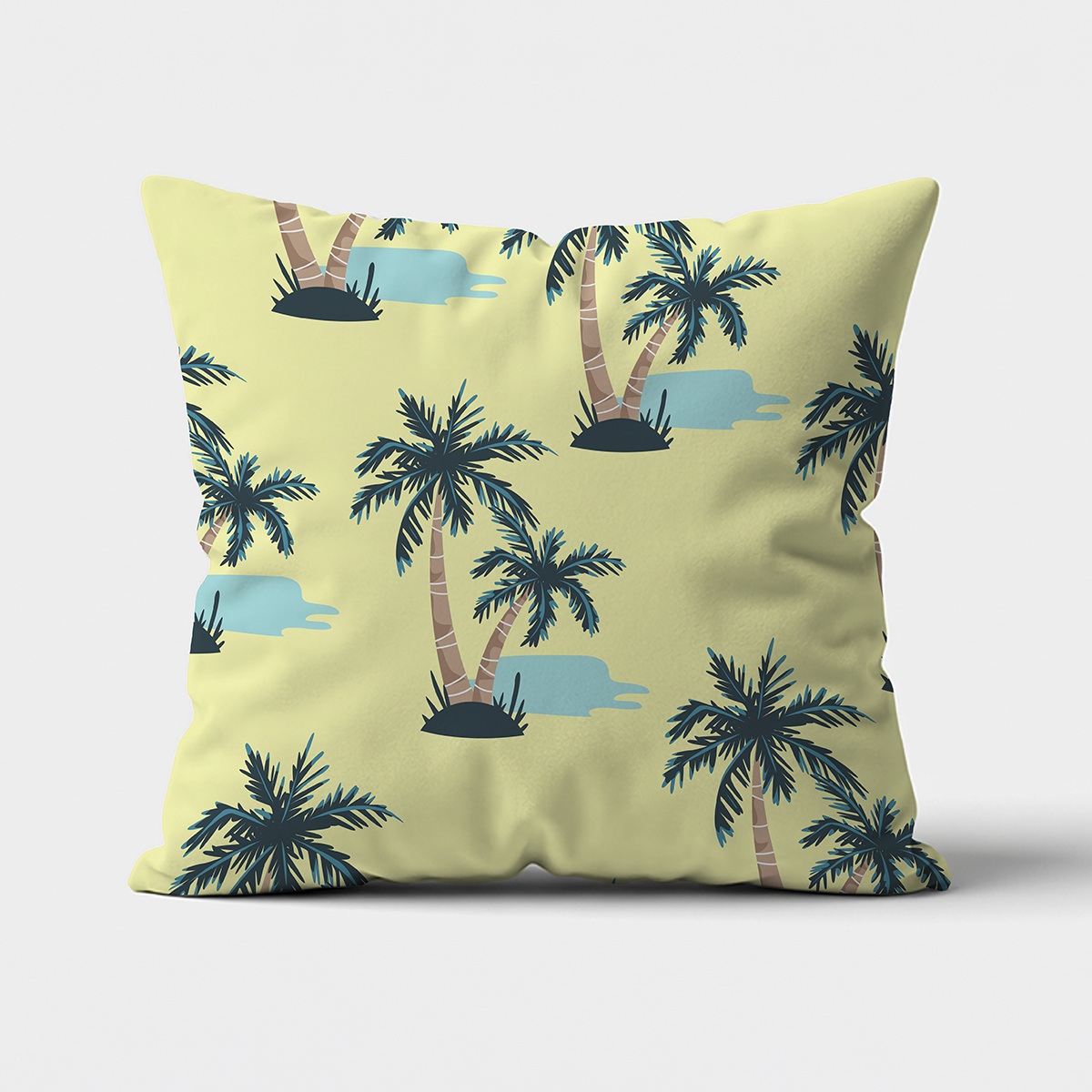 Główne ujęcie poduszki z motywem palm na jasnym tle