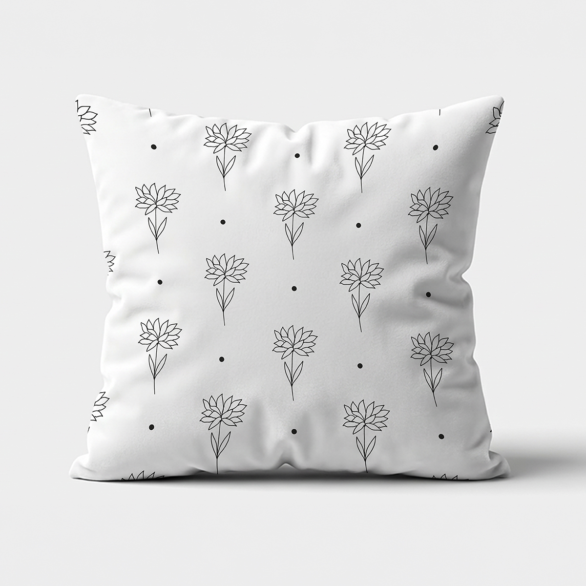 poduszka dekoracyjna z czarnymi szkicami kwiatów na białym tle — widok z przodu