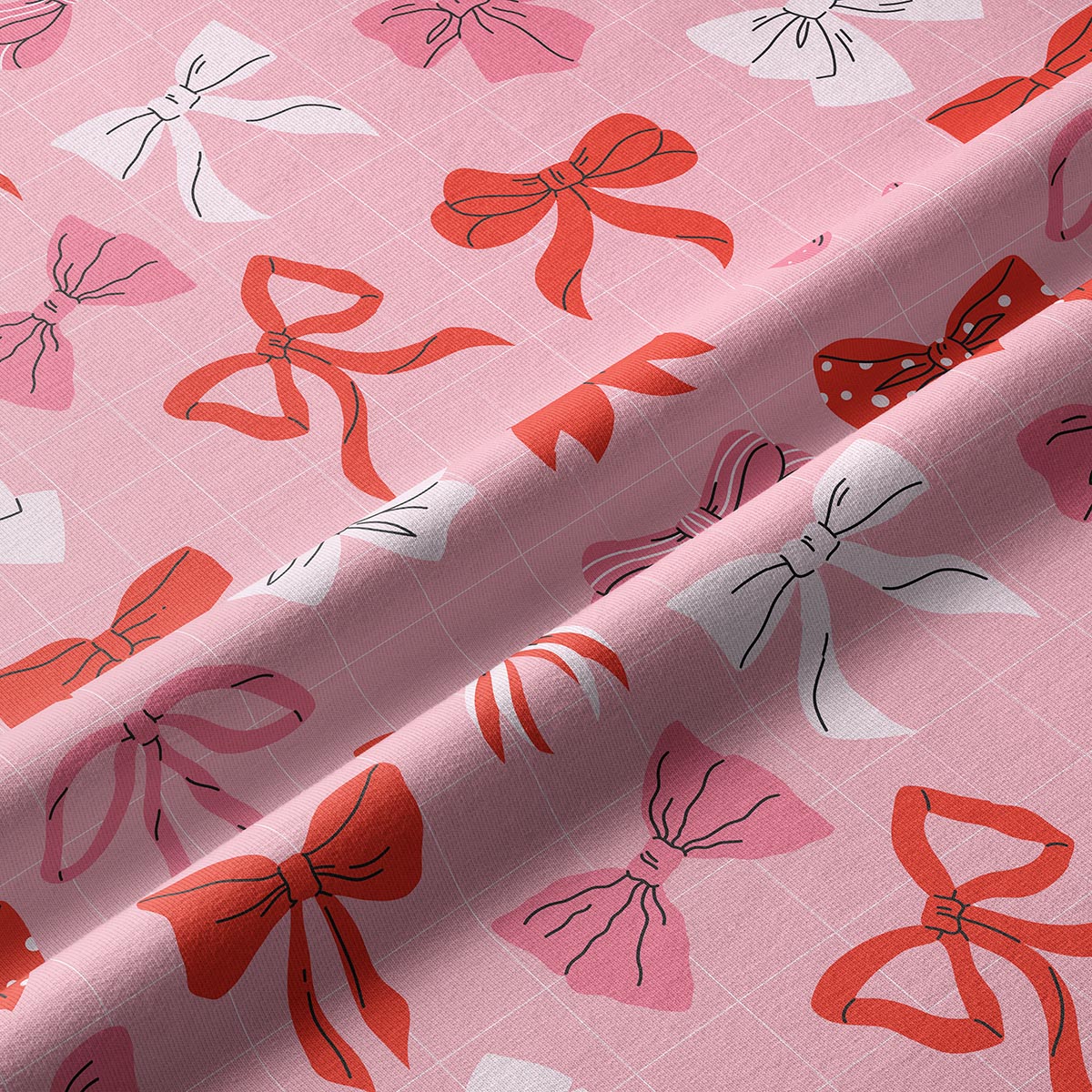 zbliżenie na wzór kokardek i drobną kratkę detal tkaniny